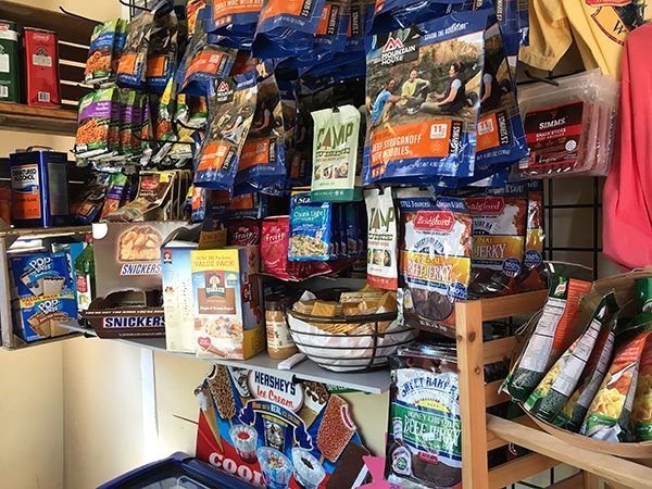 A typical trail-town outfitter shelf — mostly Mountain House pouches, little variety